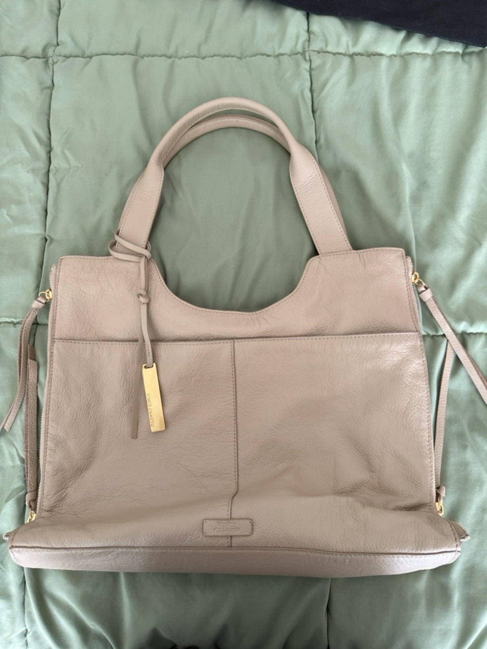 Vince Camuto bag. Zipper sides / expands soft leather. Barely used